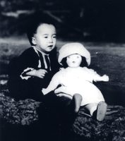 [Young Margaret (Keiko Inouye) with her doll]