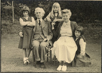 Formal, seated photograph of Russell family