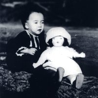 [Young Margaret (Keiko Inouye) with her doll]