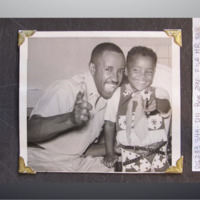 Father and Adopted Son Posing As Cowboys